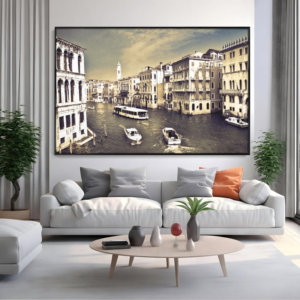 Tablou canvas cu panoramica cu canale si barci in venetia, in rama de aluminiu negru, pe perete intr-un living